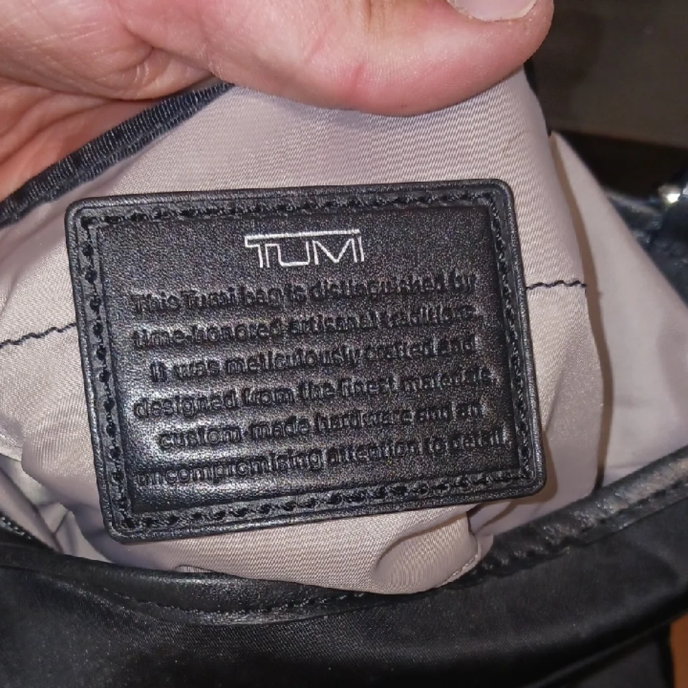 Tumi Black Messenger Bag with Adjustable Strap